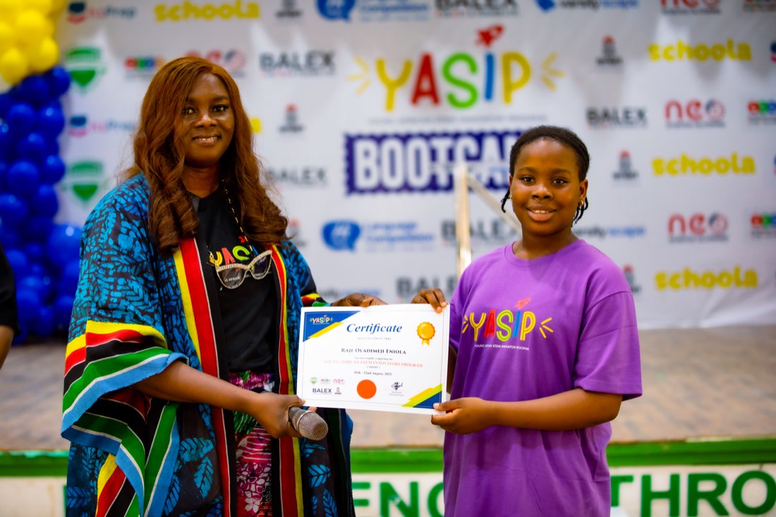 A student receiving a certificate