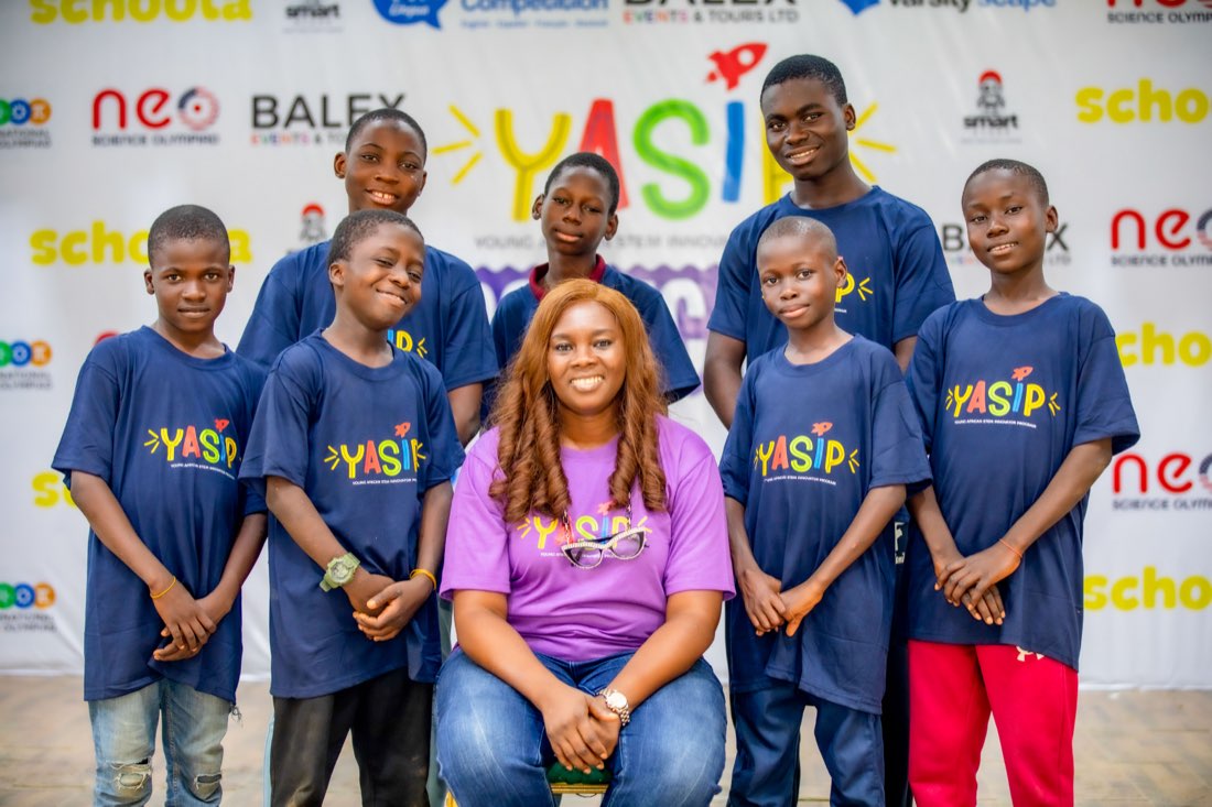 A group of students in YASIP shirts