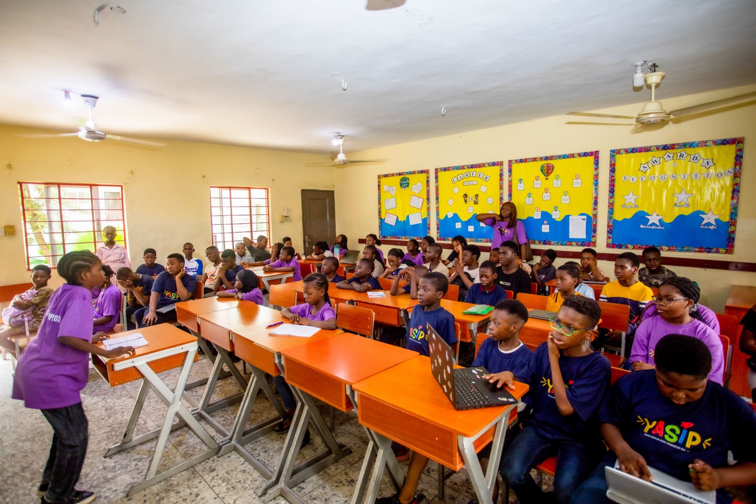 A YASIP classroom full of students learning on laptops